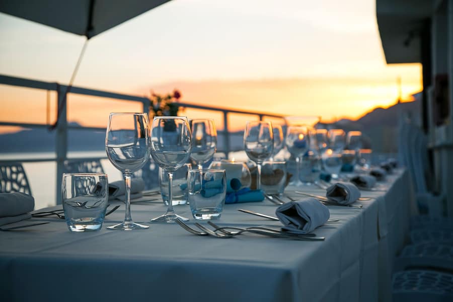 Private table set for dinner at sunset